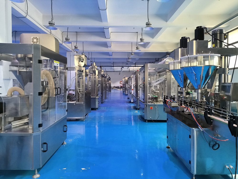 全自動(dòng)粉劑灌裝機(jī)、液體灌裝機(jī)車間