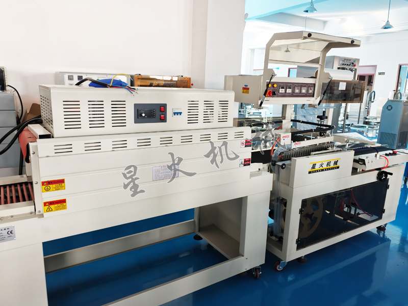 江蘇食品包裝機升級熱收縮包裝技術，給出休閑零食包裝新體驗